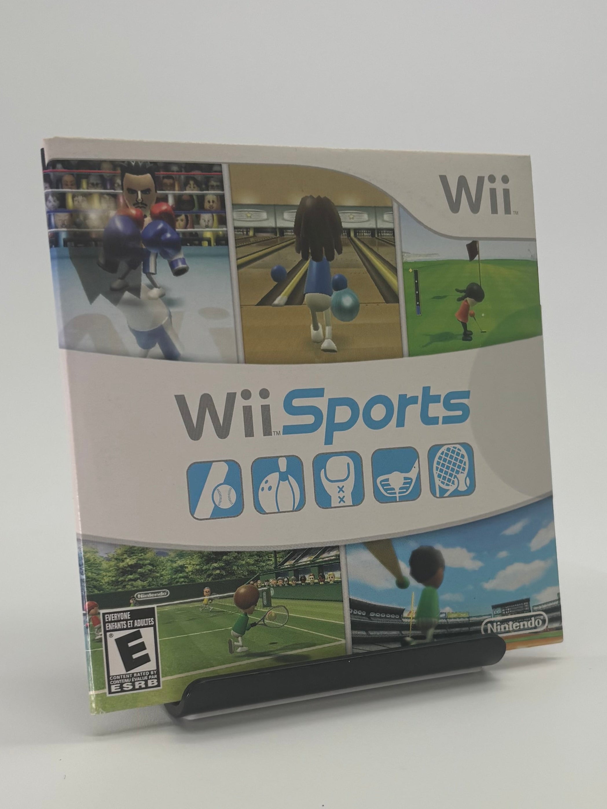 Wii Sports game box on a white surface